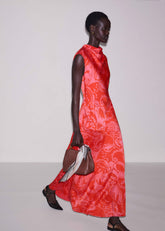 Orange Stylised Silhouette Print Bias Cut Full Length Dress meandem