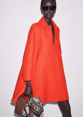 Orange Sculptural Sleeve Swing Coat meandem