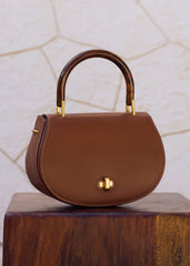 Dark Tan Resin Top Handle Structured Saddle Bag meandem